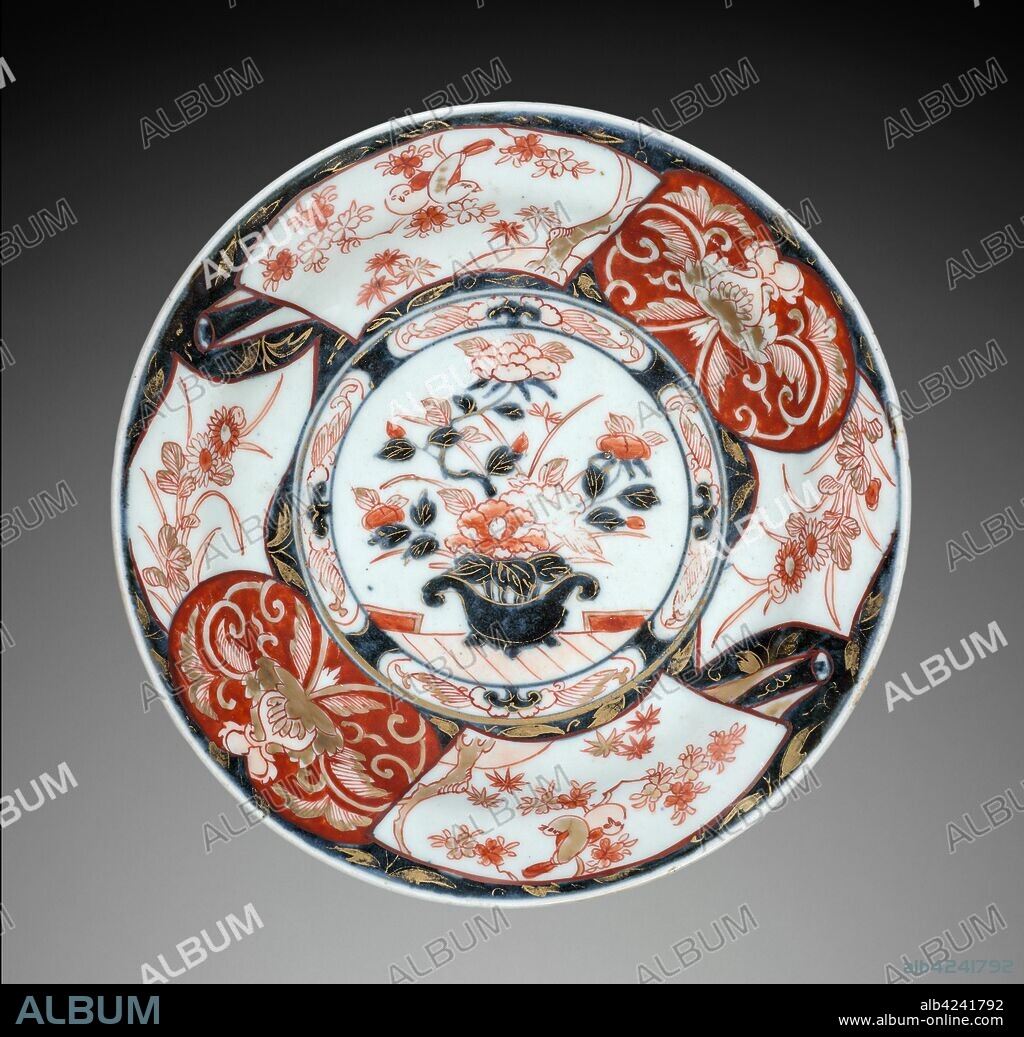 Plate with Vase of Peonies: Imari Ware, c. 1700. Japan, Saga Prefecture, Arita Kilns, Edo Period (1615-1868). Porcelain with decoration in underglaze blue overglaze, and gold; diameter: 24.8 cm (9 3/4 in.); overall: 4.2 cm (1 5/8 in.).