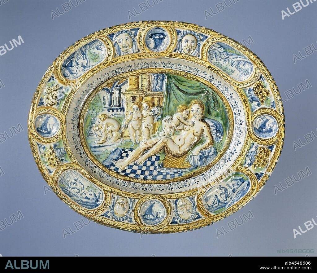 Saucer-dish, oval, with a naked female figure in the middle with five children playing, of multi-colored faience. A naked, lying woman is painted on the shelf with naked children around her. Four large sunken ovals in which landscapes are painted and four sunken circles within which sailing ships are painted. Masks and flower vases are embossed between the ovals and circles. Painted in the genre of Bernard Palissy., anonymous, London, c. 1640 - c. 1670, earthenware, tin glaze, w 49.5 cm × d 41 cm × h 6 cm.