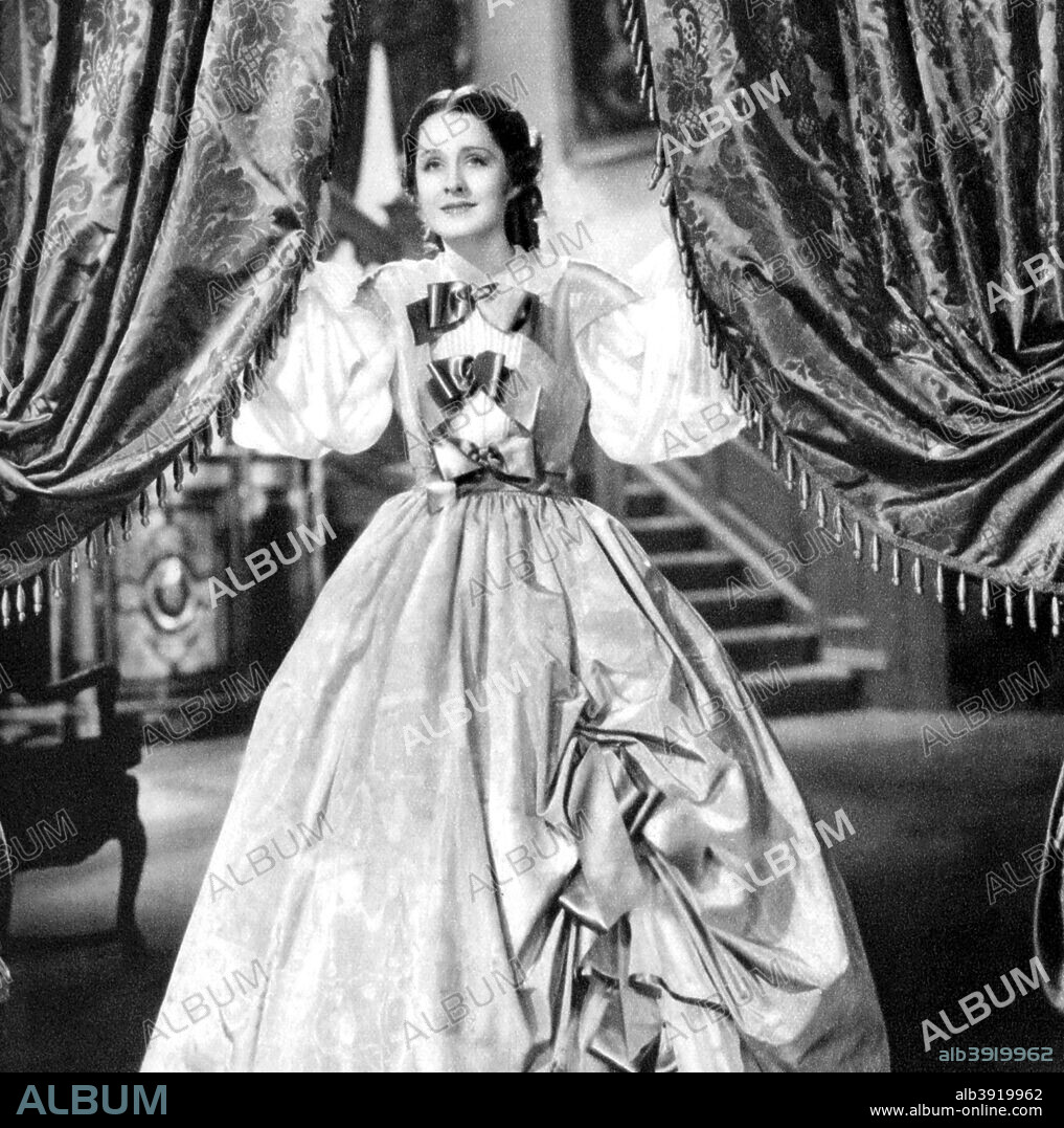 Norma Shearer, Canadian born American actress, 1934-1935. Shearer was dubbed the First Lady of the Screen. She was nominated for the Best Actress Oscar on six occasions, winning in 1930 for her performance in The Divorcee. Taken from Meet the Film Stars, by Seton Margrave. (London, 1934-1935).