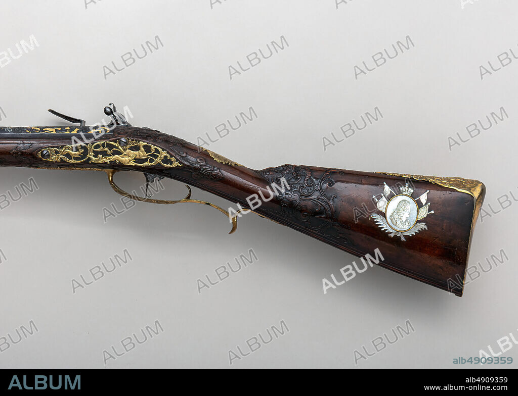 Johann Sebastian Hauschka, Flintlock Gun of Emperor Charles VI (16851740), German, Wolfenbüttel, ca. 1730, Wolfenbüttel, German, Wolfenbüttel, Steel, wood (walnut), brass, mother-of-pearl, paint, L. 55 3/4 in. (141.6 cm); L. of barrel 40 7/16 in. (102.7 cm); Cal.58 in. (14.7 mm); Wt. 6 lb. 13 oz. (3090.1 g), Firearms-Pistols-Flintlock.