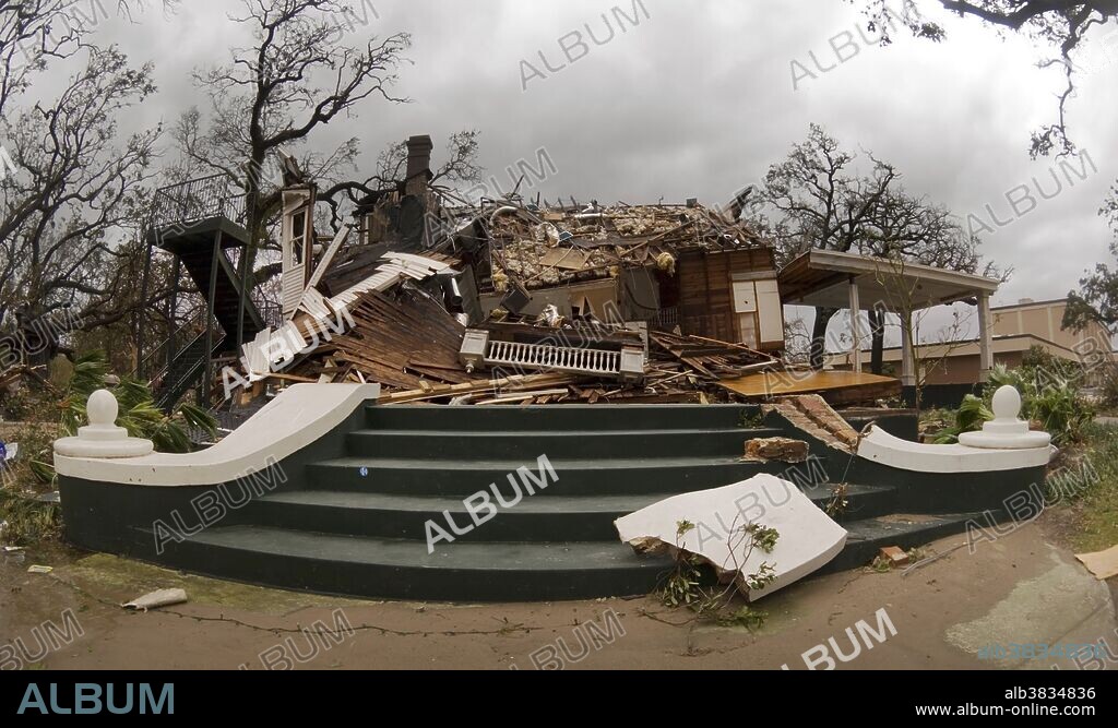 The Chimneys Restaurant, a legendary eating establishment in Gulfport, Mississippi, was destroyed by Hurricane Katrina on August 29, 2005. This photo was taken just minutes after the hurricane moved on to the north.