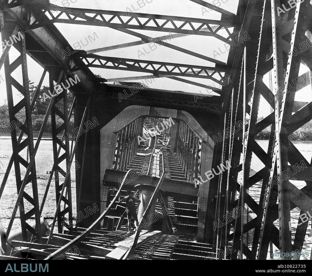 [ 1890s Japan - Nobi Earthquake 1891, Collapsed Bridge ] Collapsed Nagaragawa Railway Bridge on the Tokaido Main Line () in Gifu Prefecture after the Nobi Earthquake (, Nobi Jishin) of October 28, 1891 (Meiji 24). This photograph by William Kinnimond Burton was reproduced in "The Great Earthquake in Japan, 1891," published by Lane, Crawford & Co. in Yokohama. 19th century vintage glass slide.