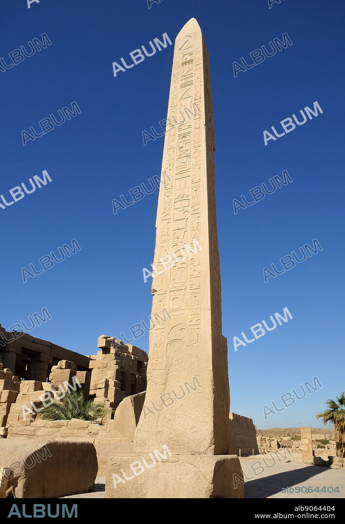 obelisk of Hatshepsut at Karnak Temple Complex, in Luxor, Egypt. Construction at the complex began during the reign of Senusret I in the Middle Kingdom and continued into the Ptolemaic period, although most of the extant buildings date from the New Kingdom. The area around Karnak was the main place of worship of the eighteenth dynasty Theban Triad with the god Amun as its head. It is part of the monumental city of Thebes.