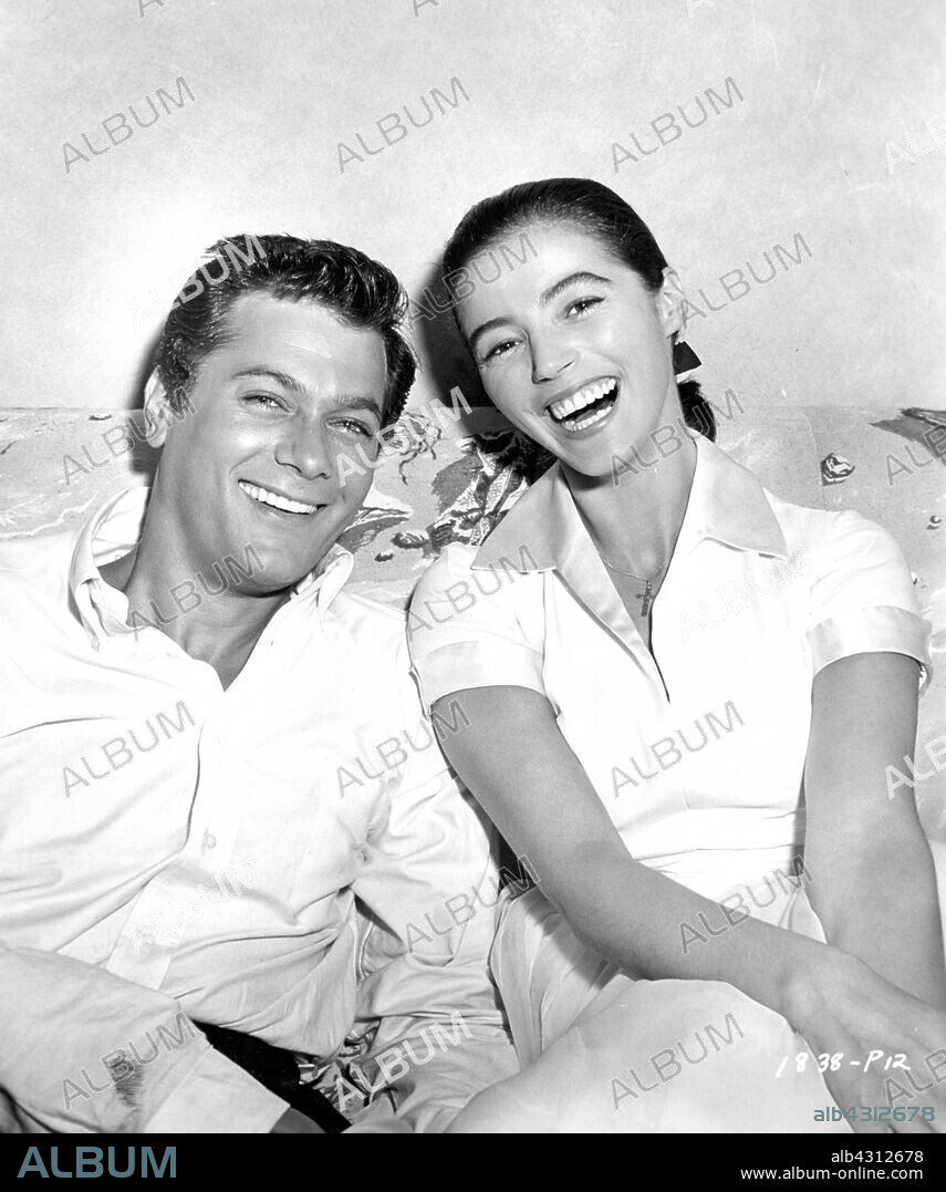 MARISA PAVAN and TONY CURTIS in THE MIDNIGHT STORY, 1957, directed by JOSEPH PEVNEY. Copyright UNIVERSAL INTERNATIONAL.
