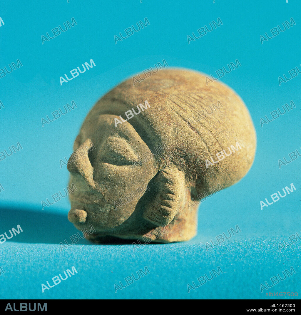 Pre-Columbian Art. Ecuador. Pre-Inca Period. Period of Regional Development. Jama-Coaque Culture. Coast of Ecuador (500BC-500AD). ceramic head. 300-200 BC-700-800 AD.  Ecuador.