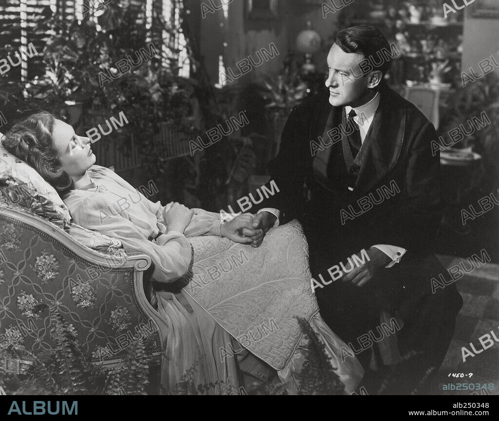 GEORGE SANDERS and GERALDINE FITZGERALD in THE STRANGE AFFAIR OF UNCLE HARRY, 1945, directed by ROBERT SIODMAK. Copyright UNIVERSAL PICTURES.