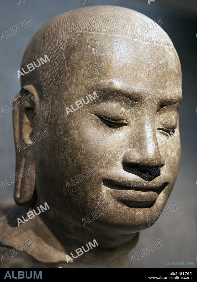 Jayavarman VII (1125–1215) was a king (reigned c.1181-1215) of the Khmer Empireat Angkor. Cambodia. He was the son of King Dharanindravarman II (r. 1150-1160) and Queen Sri Jayarajacudamani. He married Jayarajadevi and then, after her death, married her sister Indradevi. The two women are commonly thought to have been a great inspiration to him, particularly in his unusual devotion to Buddhism, as only one prior Khmer king had been a Buddhist. Over the 30 some years of his reign, Jayavarman embarked on a grand program of construction that included both public works and monuments. As a Mahayana Buddhist, his declared aim was to alleviate the suffering of his people. One inscription tells us, 'He suffered from the illnesses of his subjects more than from his own; the pain that affected men's bodies was for him a spiritual pain, and thus more piercing'. This declaration must be read in light of the undeniable fact that the numerous monuments erected by Jayavarman must have required the labor of thousands of workers, and that Jayavarman's reign was marked by the centralization of the state and the herding of people into ever greater population centers. Historians have identified three stages in Jayavarman's building program. In the first stage, he focussed on useful constructions, such as hospitals, rest houses along the roads, and reservoirs. Thereafter, he built a pair of temples in honor of his parents: Ta Prohm in honor of his mother and Preah Khan in honor of his father. Finally, he constructed his own 'temple-mountain' at Bayon and developed the city of Angkor Thom around it. He also built Neak Pean ('Coiled Serpent'), one of the smallest but most beautiful temples in the Angkor complex, a fountain with four surrounding ponds set on an island in that artificial lake.