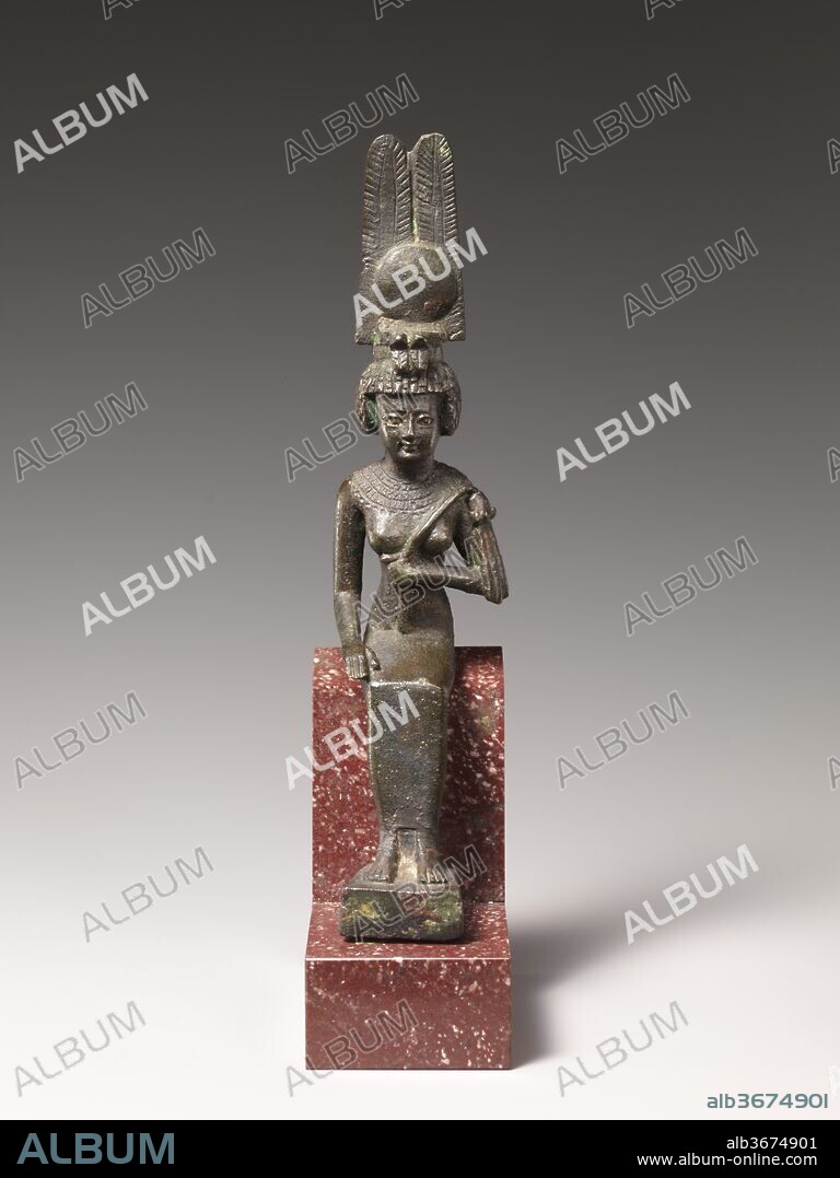 Khereduankh, the mother of Imhotep. Dimensions: H. 16 × W. 3.7 × D. 5.6 cm (5 5/16 × 1 7/16 × 2 3/16 in.)
H. (with tang): 16.5 cm (6 1/2 in.). Dynasty: Dynasty 27-30. Date: 332-30 B.C..
Khereduankh, the mother of Imhotep in late beliefs, received divine status like her son. Typically she wears on her short rounded hairstyle the feather crown and double uraei of an Egyptian queen-like goddess, and carries a queen's flywhisk scepter.