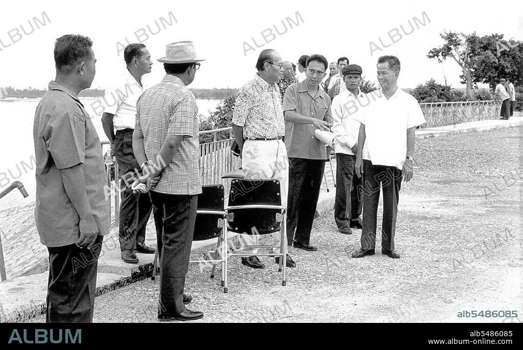 Khieu Samphan (born July 27, 1931) was the president of the state presidium of Democratic Kampuchea (Cambodia) from 1976 until 1979. As such, he served as Cambodia's head of state and was one of the most powerful officials in the Khmer Rouge movement, though Pol Pot was the group's true political leader and held the most extensive power.  Ne Win (born on 24 May or 14 May 1911 or 10 July 1910 – 5 December 2002) was a politician and military commander. He was Prime Minister of Burma from 1958 to 1960 and 1962 to 1974 and also head of state from 1962 to 1981. He also was the founder and from 1963 to 1988 the chairman of the Burma Socialist Programme Party, which from 1964 until 1988 was the sole political party in the Burmese nation state.