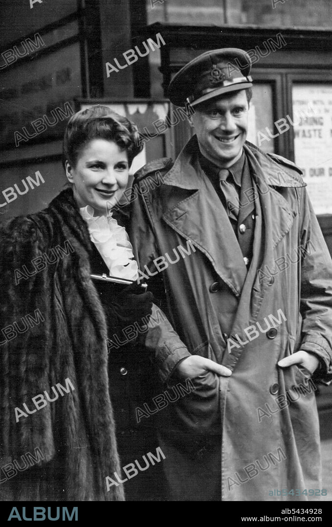 Diana Wynyard Marries Film Director -- The bride and bridegroom leaving Caxton Hall after the ceremony. Miss Diana Wynyard, the famous actress, was married at Caxton Hall, London, to Capt. Carol Reed of the Army film Unit, who directed the film "Kipps" in which she appeared. February 3, 1943.