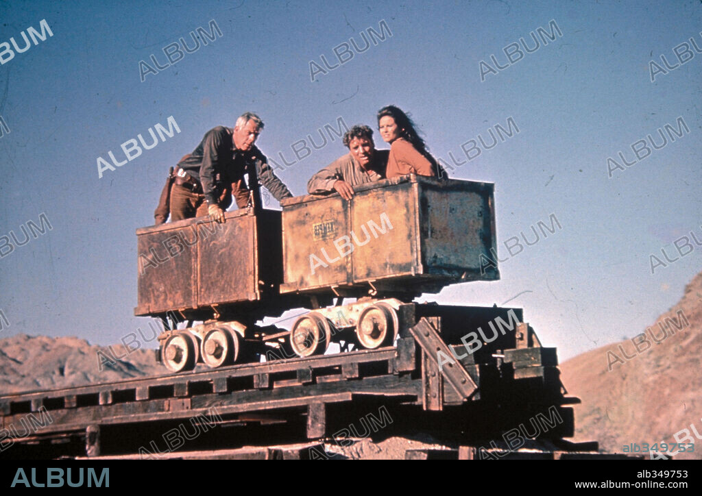BURT LANCASTER, CLAUDIA CARDINALE and LEE MARVIN in THE PROFESSIONALS, 1966, directed by RICHARD BROOKS. Copyright COLUMBIA PICTURES.