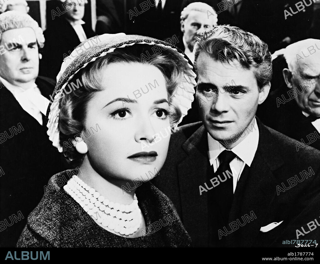 DIRK BOGARDE and OLIVIA DE HAVILLAND in LIBEL, 1959, directed by ANTHONY ASQUITH. Copyright M.G.M.