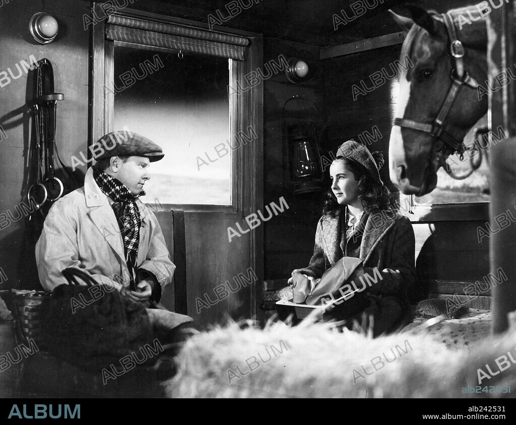 ELIZABETH TAYLOR and MICKEY ROONEY in NATIONAL VELVET, 1944, directed by CLARENCE BROWN. Copyright M.G.M.