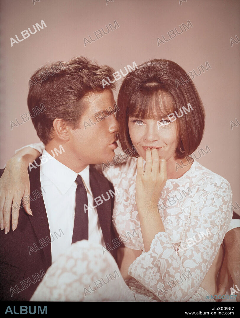 LESLIE CARON and WARREN BEATTY in PROMISE HER ANYTHING, 1965, directed by ARTHUR HILLER. Copyright PARAMOUNT PICTURES.