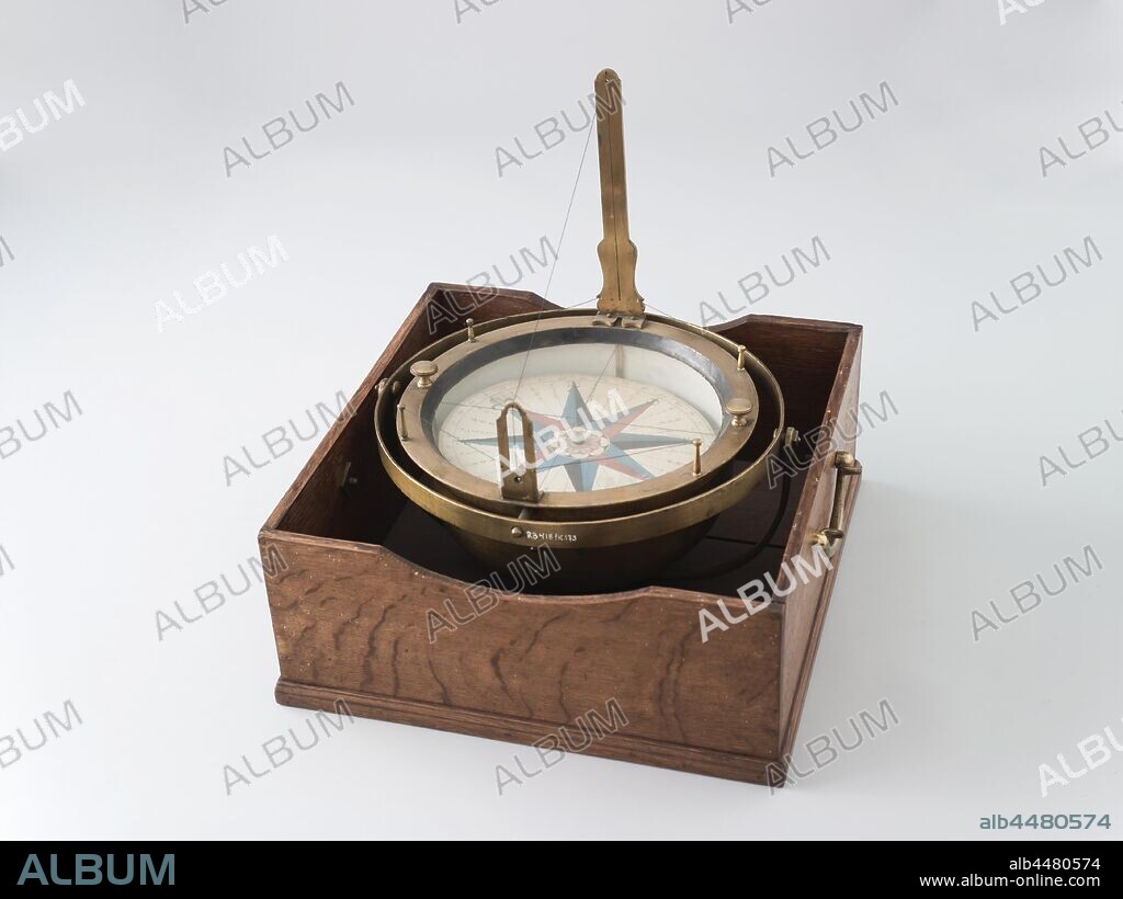 Azimuth Compass, Azimuth compass in cardanus ring in a wooden box, the lid of which is missing. The cardan ring can be turned for bearing. The compass has a fixed pelorus, the boiler is weighted with a lead weight at the bottom. The rose is made of mica, covered with paper on both sides, it is colored by hand and balanced with some black lacquer on the bottom., Johannes van Keulen (I) (mentioned on object), Amsterdam, c. 1750, wood (plant material), brass (alloy), iron (metal), glass, precious stone (material), lacquer (coating), yarn, paper, h 16 cm × w 39 cm × d 40 cm.