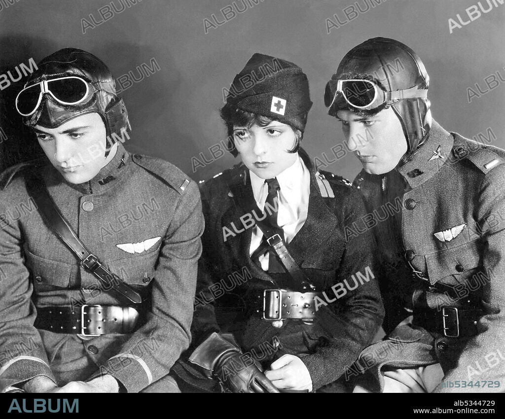 CHARLES "BUDDY" ROGERS, CLARA BOW and RICHARD ARLEN in WINGS, 1927, directed by WILLIAM A. WELLMAN. Copyright PARAMOUNT PICTURES.
