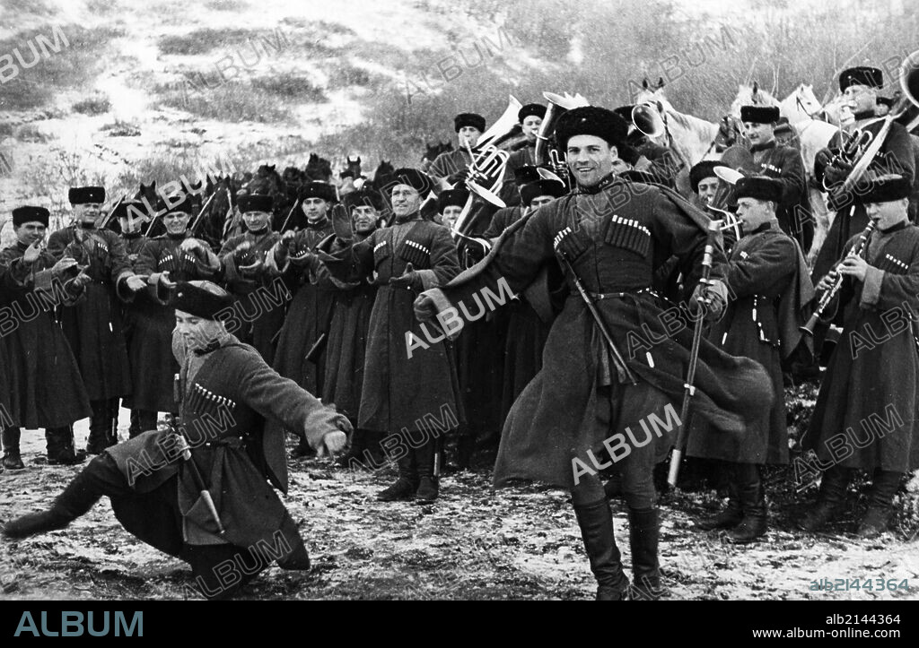Soviet red army cossacks enjoying a little downtime by giving a traditional dance performance, february 1938.