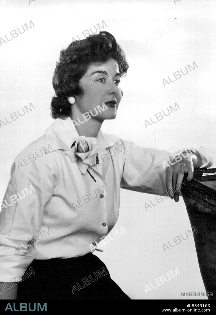 Lady George Scott -- Wife of Lord George Scott, a brother of H.R.H. The Duchess of Gloucester and of the Duke of Buccleuch; before her marriage, in 1938, she was Miss Mollie Bishop and is well known under that name as an artist. Lord and Lady George Scott have a son and two daughters. January 10, 1955. (Photo by Yevonde, Camera Press).