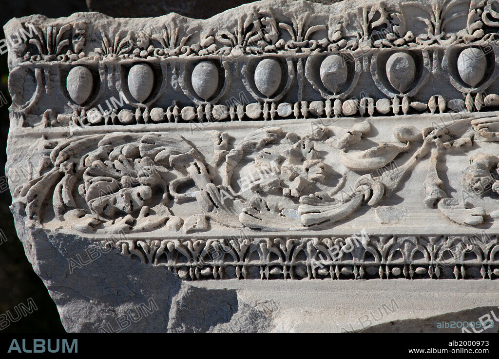 Turkey, Pergamon, Temple of Dionysus, Reliefs. The Temple of Dionysus was built in 2nd century BC rises on a podium. In the Roman Era it was rebuilt from marble. The temple was reconstructed in the 3rd century AD by Emperor Caracalla, after a great fire.
