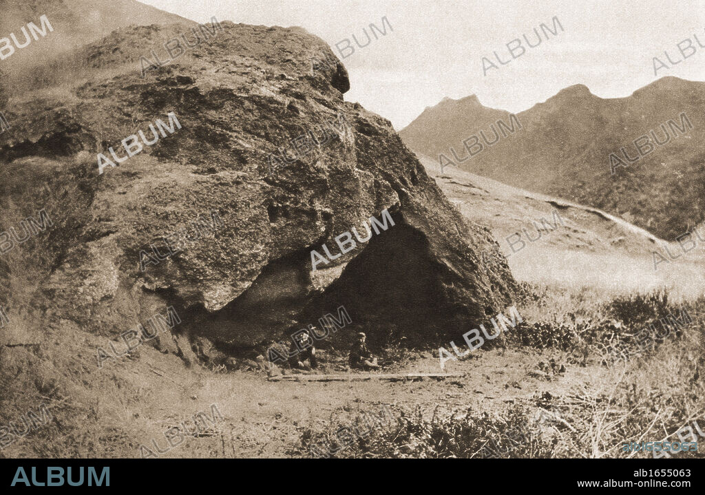 The cave on Juan Fernandez Island in which Alexander Selkirk lived. Now known as Robinson Crusoe cave. From The Illustrated War News published 1915.