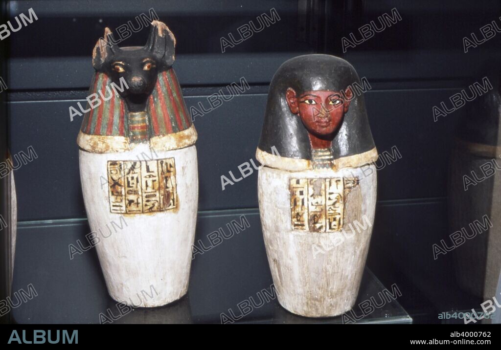 Anubis Canopic Jars, 22nd Dynasty, c1550BC-1069 BC. Containers used to store internal organs removed from the deceased's body during mummification. Their stoppers were made in the likeness of Horus?s four sons, funerary gods whose role was to guard the internal organs. Qebehsenuef, with the head of a falcon, looked after the intestines, Hapy, with the head of a baboon, safeguarded the lungs, Duamutef, with the head of a jackal, protected the stomach, and Imsety, with a human head, looked after the liver. Louvre.
