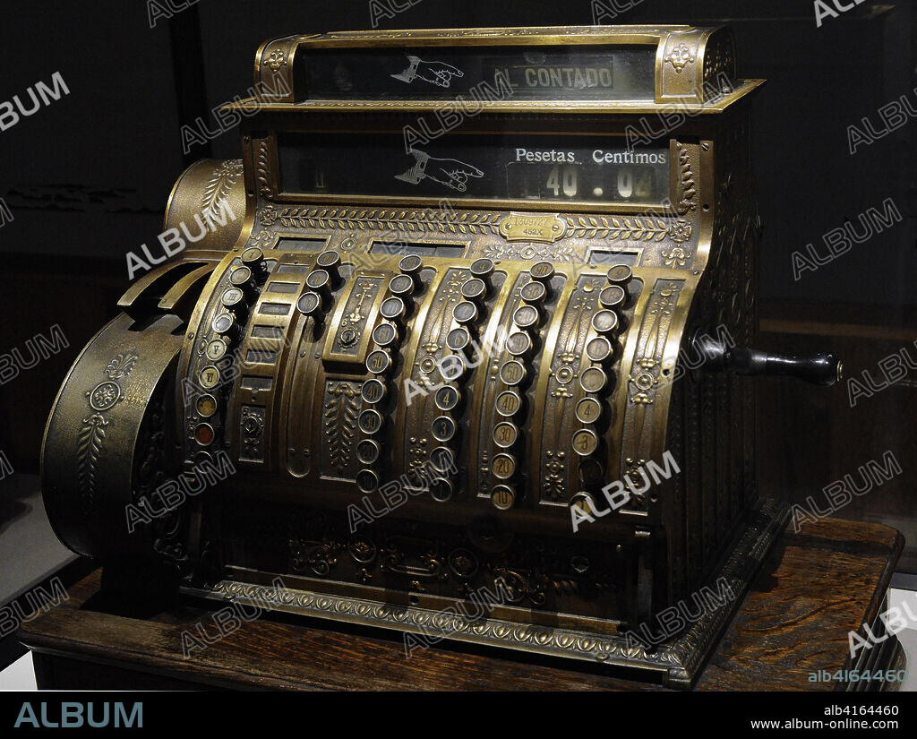 Cash register. Bronze and wood. National Cash Register Company. Class 400. United States, 1913. National Archaeological Museum. Madrid. Spain.