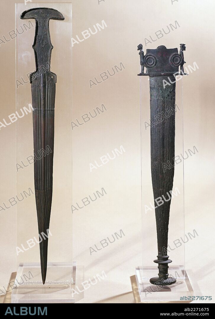 Sword and scabbard decorated with anthropomorphic figurines, bronze, from the Necropolis of Mandrione Cavalupo, Vulci, Lazio, Italy. Etruscan civilisation, 8th century BC.