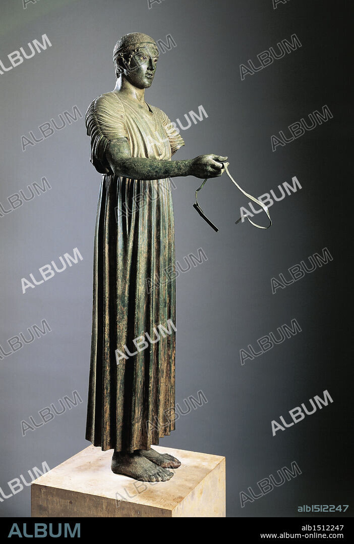 Greek civilization, 5th century b.C. Bronze statue of the Charioteer of Delphi, also known as Heniokhos, circa 475 b.C., height 180 cm. From Delphi, Greece.