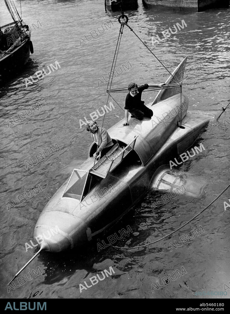 World's Water Speed Record Attempt - Mr. and Mrs. F.E. Hanning-Lee in the boat, which has a double cockpit and dual controls.An attempt on the world's water speed record at present held by America with a speed of 160 m.p.h. is to be made on a specially-designed jet-engine hydrofoil, the "White Hawk", by the designer and his wife, Mr. and Mrs. Hanning-Lee, of London, who are how conducting tests with the boat at Margata. June 23, 1952.