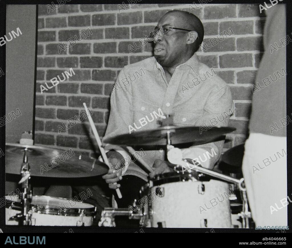 Drummer Rod Youngs playing at The Fairway, Welwyn Garden City, Hertfordshire, 25 January 2004.