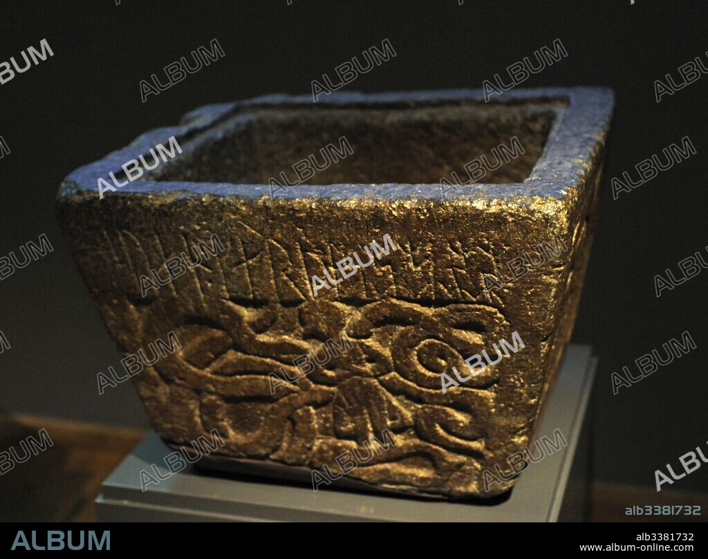 Paleo-Christian Era. Baptismal font with the inscription "Sven made me" and a relief depicting Gunnar in the serpent's nest, the scene of the Volsunga saga. From Norum, provincial of Bohuslan. Historic museum. Stockholm. Sweden.