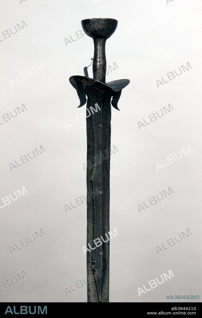Sword (Pattisa). Culture: Indian, South Indian. Dimensions: L. 41 in. (104.1 cm); W. 3 7/16 in. (8.7 cm); D. 3 3/4 in. (9.5 cm); Wt. 2 lb. 14.1 oz. (1306.9 g). Date: possibly 17th-18th century.