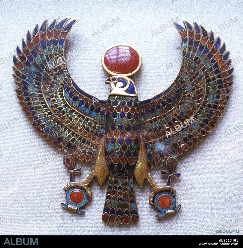 Pectoral jewel from the treasure of Tutankhamun, Ancient Egyptian, c1325 BC.  A pectoral jewel showing Horus, the falcon-headed god, crowned with a sun disc (aten) with an ankh, the symbol of life, attached to each claw. Once a great sky and sun-god, Horus became combined with Horus the son of Isis and Osiris. From the Treasure of Tutankhamun (ruled 1333-1323 BC), discovered in the pharaoh's tomb.