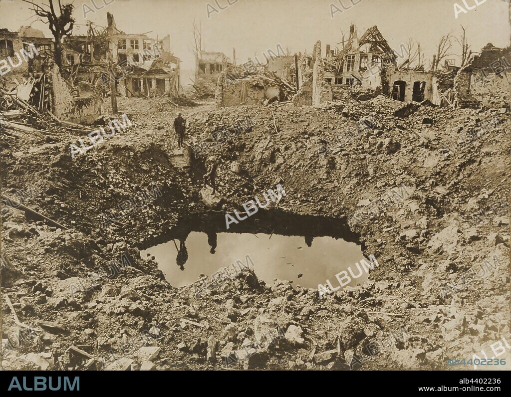 Photograph - 'A Big Crater', Ypres, Belgium, World War I, 25 Sep 1917, Photograph of a bomb crater in the middle of the town in the aftermath of the battle of Ypres, Belgium. The Battle of Menin Road occured 20-25 September 1917. It was part of the so-called 'Third Battle of Ypres' on the Western Front.