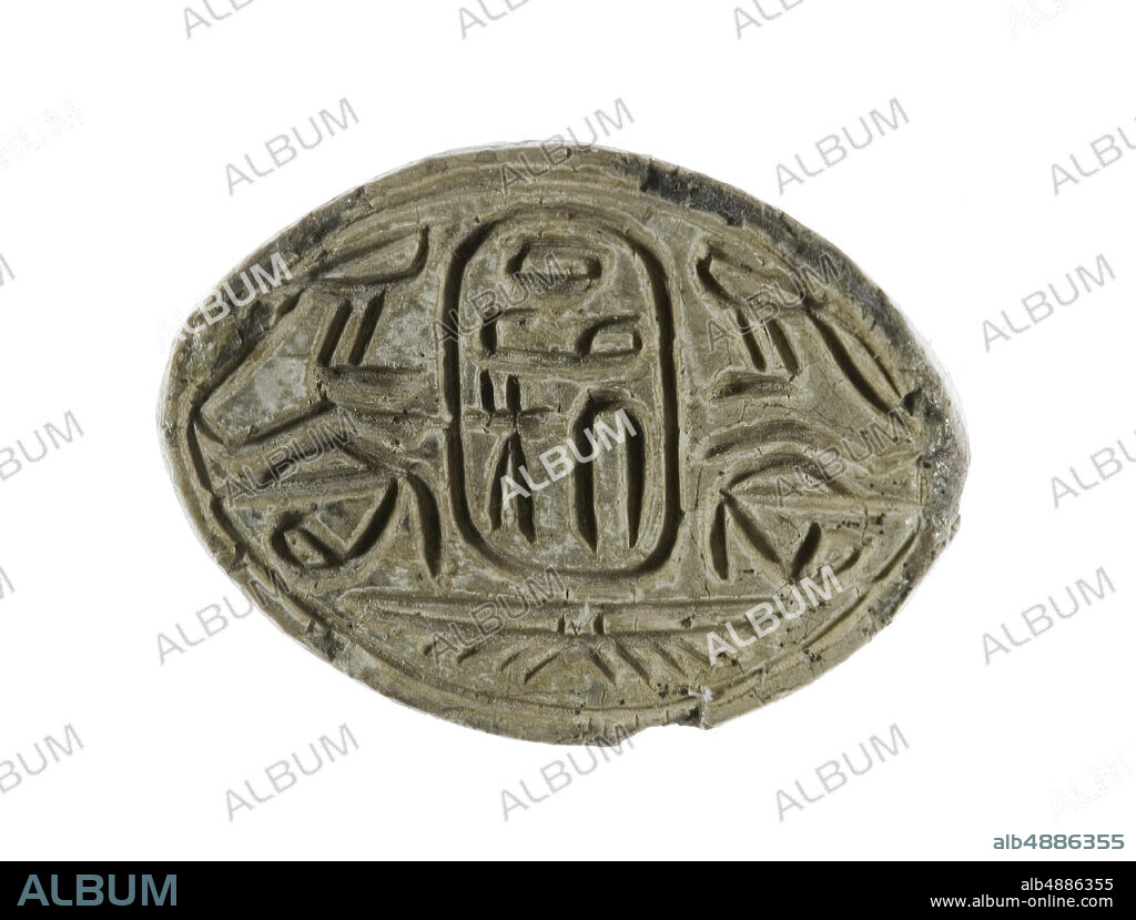 Cowroid Seal Amulet with the Name of the Hyksos King Apophis, Second Intermediate Period, Dynasty 15, reign of Apophis, ca. 15811541 B.C., From Egypt, Eastern Delta, Steatite, white glaze, l.1.7 cm (11/16 in).
