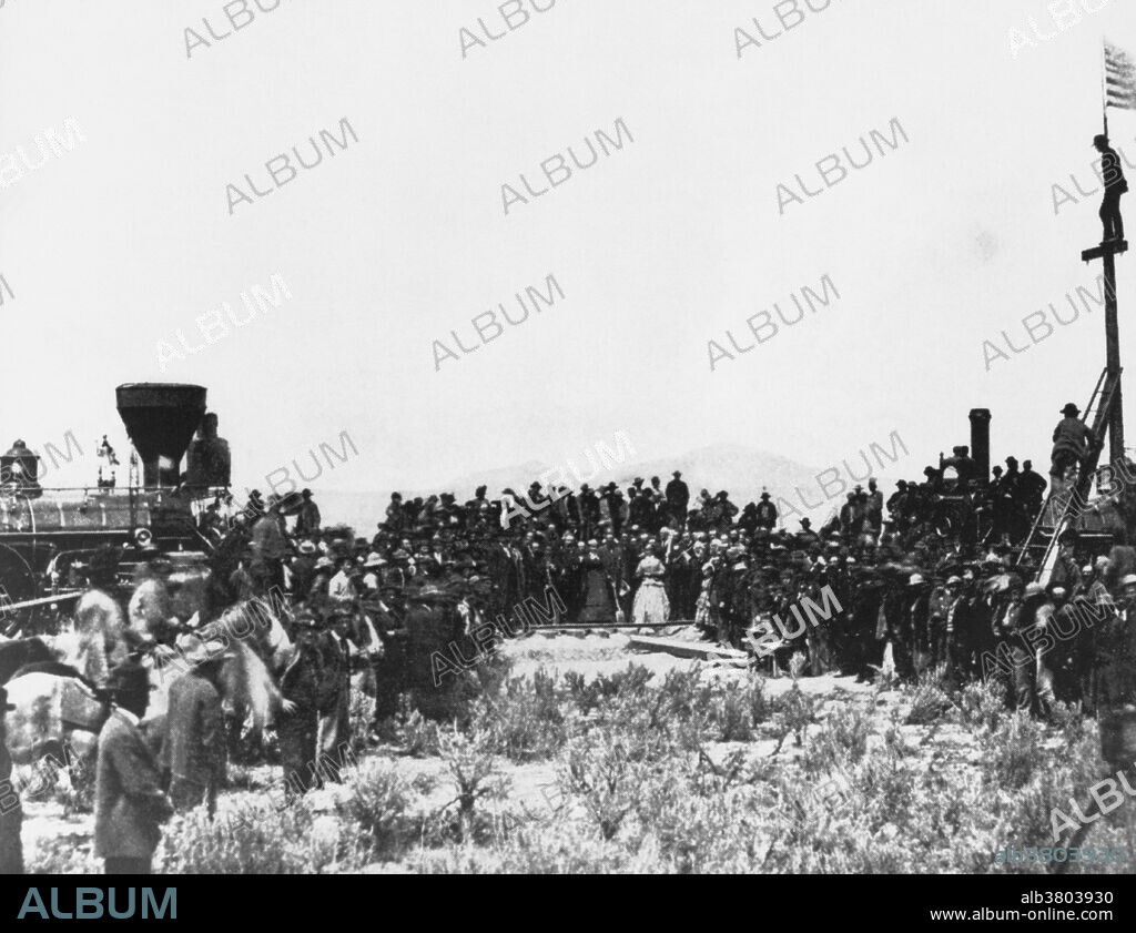 On May 10, in anticipation of the ceremony, Union Pacific No. 119 and Central Pacific No. 60 locomotives were drawn up face-to-face on Promontory Summit in the Utah Territory. It is unknown how many people attended the event; estimates run from as low as 500 to as many as 3,000; government and railroad officials and track workers were present to witness the event. Completing the last link in the Transcontinental Railroad with a spike of gold was the brainchild of David Hewes, a San Francisco financier and contractor. Two of the sides were engraved with the names of the railroad officers and directors. A special tie of polished California laurel was chosen to complete the line where the spike would be driven. The the ceremonial final spike driven by Leland Stanford to join the rails of the First Transcontinental Railroad across the United States connecting the Central Pacific and Union Pacific railroads.