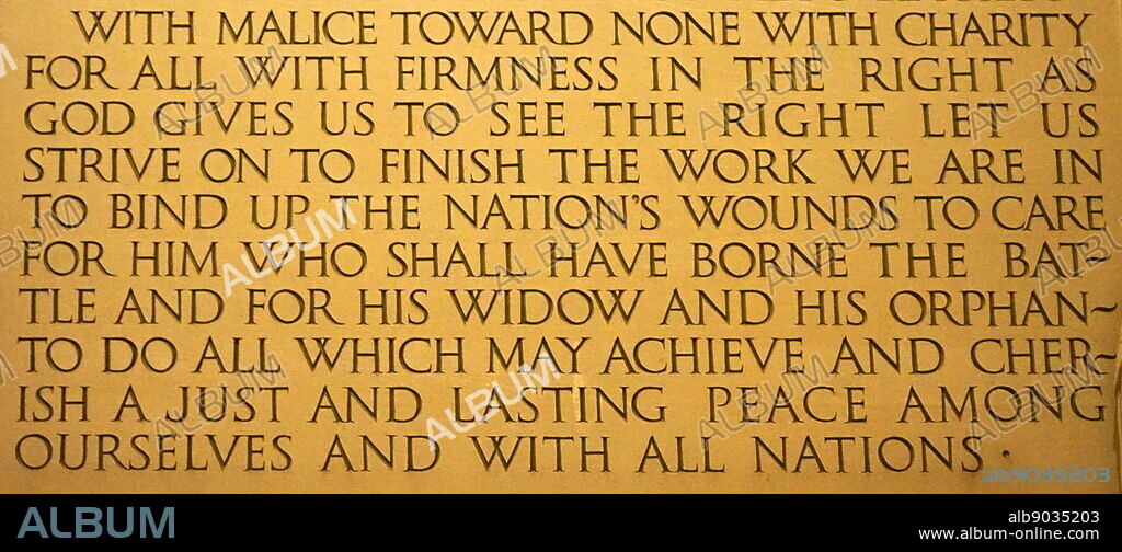 Abraham Lincoln's second inaugural address inscribed on a wall of the Lincoln Memorial, an American national monument built to honour the 16th President of the United States, Abraham Lincoln, at night. Dated 21st Century.