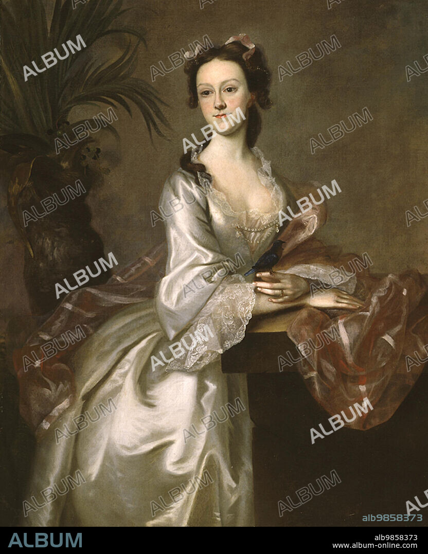 Portrait of Fannie Pigott, Mrs. John Pigott, between 1740 and 1763. Joseph Blackburn visited Bermuda, which had come under British domination in 1684 and was closely connected to the American mainland by trade routes. Here he painted at least seventeen portraits, seven devoted to the members of the family of Francis Jones, governor of the colony. Fannie, Francis Jones’s daughter, married Captain John Pigott by, a customs collector, in 1745. The British considered Bermuda an exotic locale, as Blackburn shows in this portrait of Mrs. Pigott by posing her in front of a palmetto with a small native bird perched on her finger.  Fannie Pigott wears pearls and an elegant silver satin gown accompanied by a gauzy pink-and-white plaid silk shawl. The delineation of such luxurious materials was Blackburn’s specialty and demonstrated his training with in the English rococo aesthetic.
