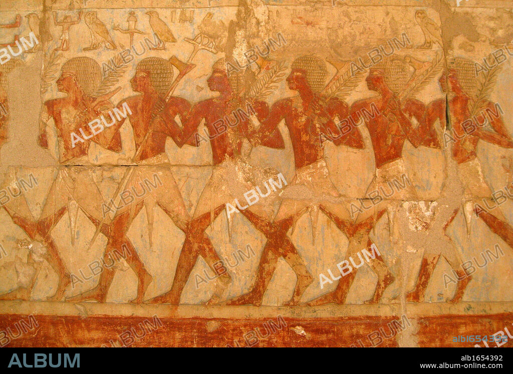 Relief showing members of Queen Hatshepsut's trading expedition to the mysterious 'Land of Punt' from this pharaoh's elegant mortuary temple at Deir El-Bahri. Hatshepsut, 18th Dynasty, reigned 1503-1482 BC.