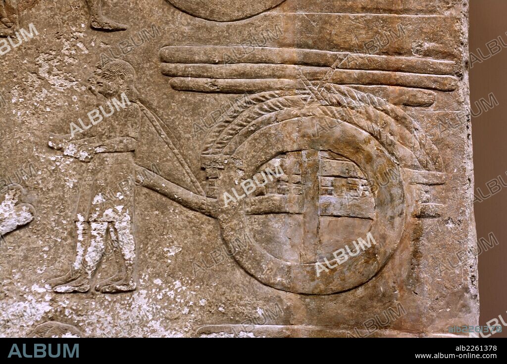Relief of Winged bull for Sennacherib at nearby Nineveh (704-681 BC). Instead of the usual scenes of warfare, they show the transport of a human headed winged bull from quarry to palace, part of Sennacherib's construction work.