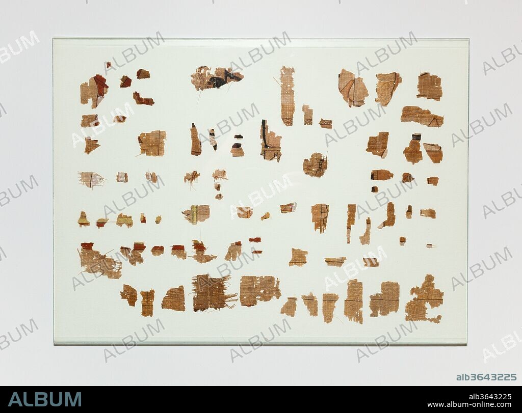 Papyrus fragments from the Book of the Dead of the Scribe Roy. Dynasty: Dynasty 18, late, or early 19. Reign: Haremhab or later. Date: ca. 1323-1295 B.C., possibly.
These fragments come from a Book of Coming Forth by Day, commonly known as a Book of the Dead, dedicated to a scribe named Roy. This official lived during the late 18th or early 19th century, likely during the reign of Haremhab or later. Said to have been found  with a heart scarab (21.2.19-Deaccessioned) and a double ba-bird amulet (21.2.20), the papyrus from which these fragments come would have been buried with Roy, meant magically to assist him with his journey to the afterlife and his eternal existence there as one of the blessed dead.
