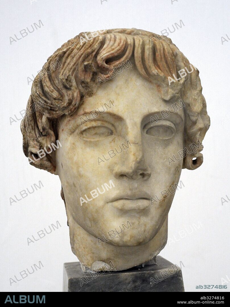 Head of the Omphalos Apollo. White marble, from Baia, Hadrian era from a Greek original, 5th century  BC. National Archaeological Museum, Naples. Italy.