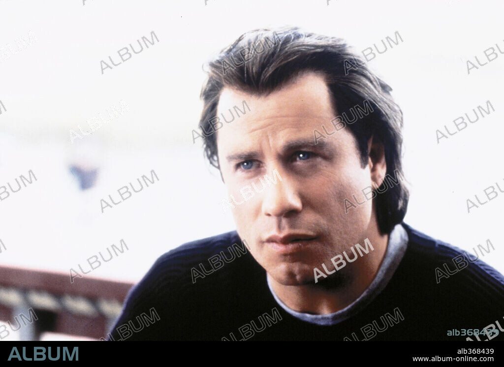 JOHN TRAVOLTA in DOMESTIC DISTURBANCE, 2001, directed by HAROLD BECKER. Copyright PARAMOUNT PICTURES.