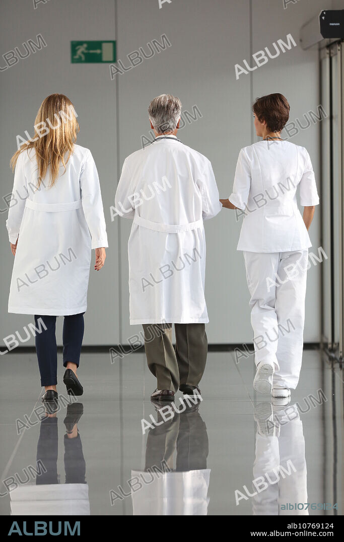 Doctors and nurses walking in corridor, Onkologikoa Hospital, Oncology Institute, Case Center for prevention, diagnosis and treatment of cancer, Donostia, San Sebastian, Gipuzkoa, Basque Country, Spain.