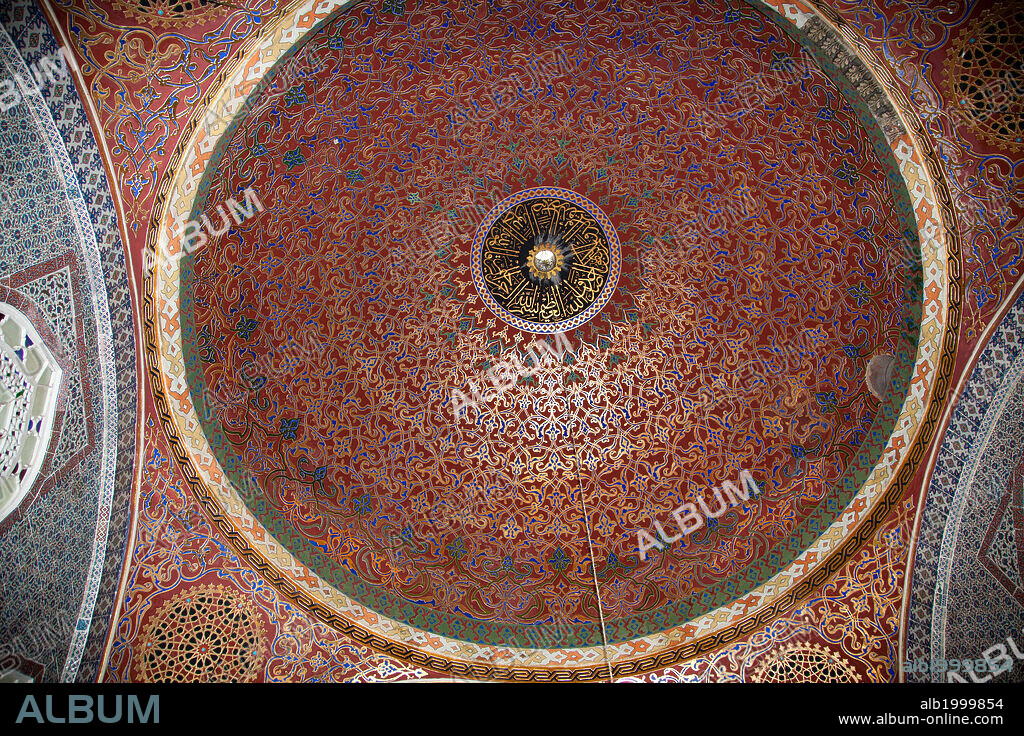 Turkey, Istanbul, Topkapi Palace, Interior, Decorated Dome with Arabic Writing. The Topkapi Palace was the official and primary residence in the city of the Ottoman Sultans. It was constructed in1459, ordered by Sultan Mehmed II and expanded over the centuries, after the 1509 earthquake and 1665 fire. In 1985 the palace became a UNESCO World Heritage Site.