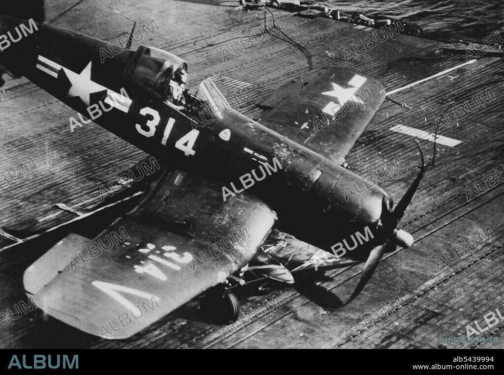 Crash Landing -- A Corsair fighter damaged by anti-aircraft fire over Korea.Crash lands on the flight deck of a United States Navy carrier somewhere off the coast of Korea. The pilot walked away unhurt. August 21, 1950. (Photo by Reuterphoto).