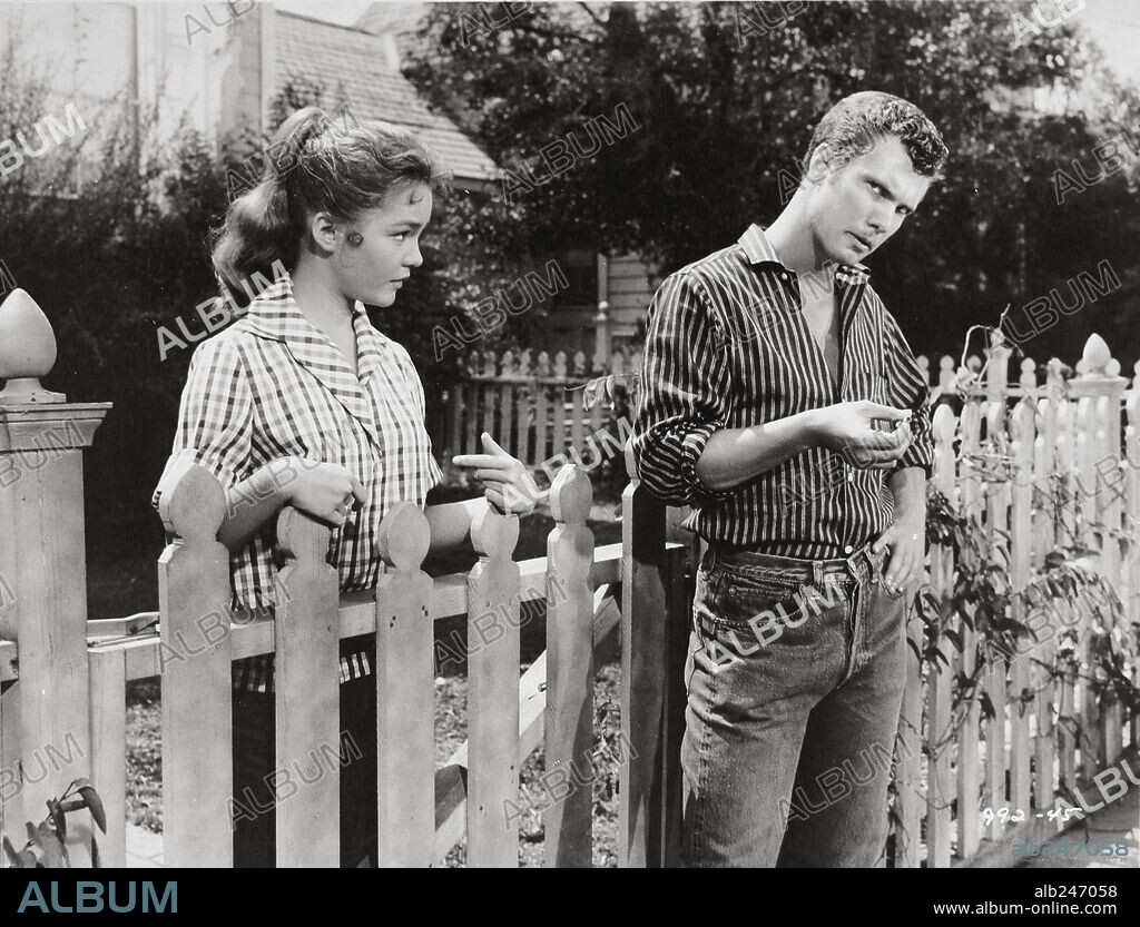 DWAYNE HICKMAN and TUESDAY WELD in RALLY 'ROUND THE FLAG, BOYS!, 1958, directed by LEO MCCAREY. Copyright 20TH CENTURY FOX.