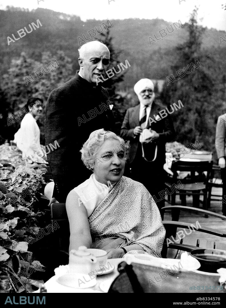 Jawarlal Nehru and His Sister Mrs. R.S. Pandit.The Indian Prime Minister is seen with his sister, who is Indian High Commissioner in London. The photograph was taken in Austria where Mr.Nehru held a conference on India's foreign policy which was attended by his Ambassador to Europe. July 27, 1955. (Photo by Camera Press).