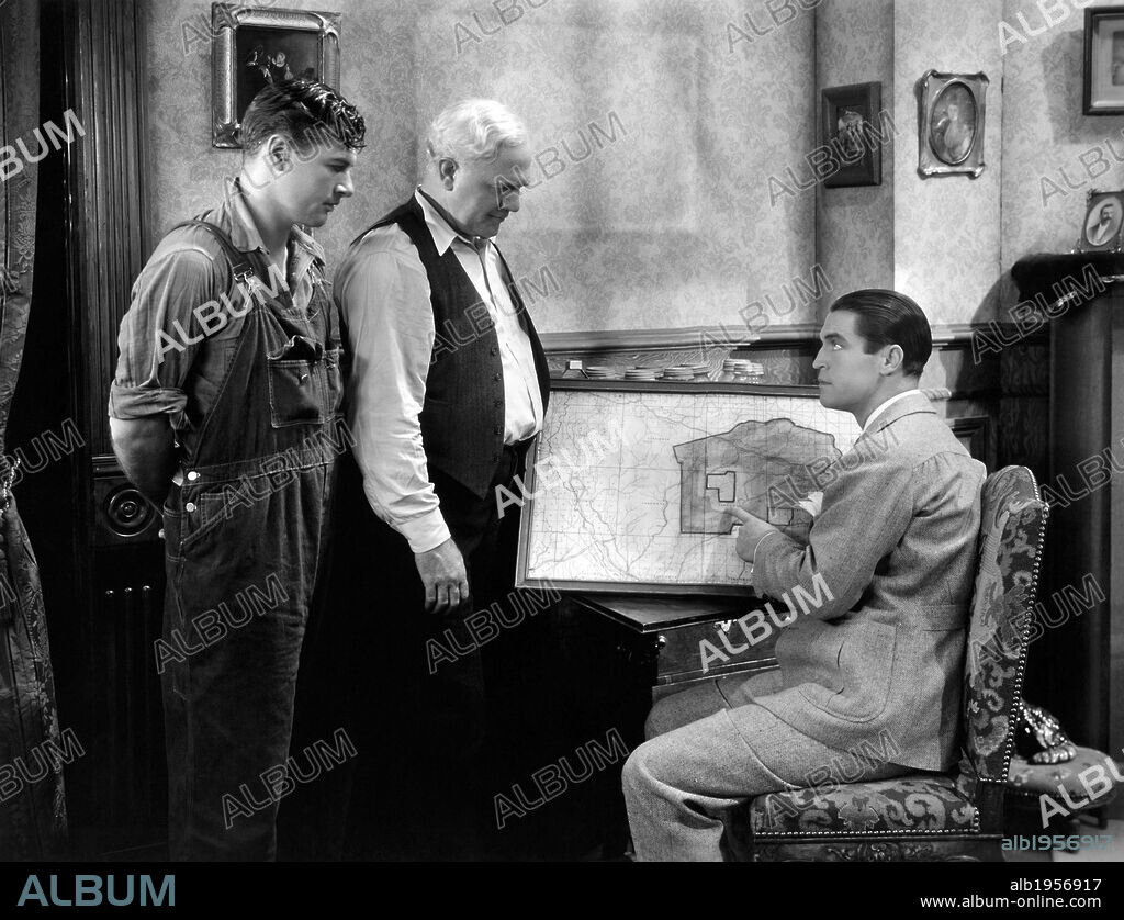 BERTON CHURCHILL, CHESTER MORRIS and RICHARD ARLEN in GOLDEN HARVEST, 1933, directed by RALPH MURPHY. Copyright PARAMOUNT PICTURES.