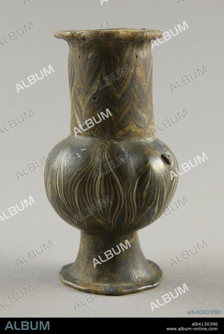 ANCIENT EGYPTIAN. Vase. Egyptian. Date: 1550 BC-1292 BC. Dimensions: 10.8 × 5.7 × 5.7 cm (4 1/4 × 2 1/4 × 2 1/4 in.). Glass, core-formed technique. Origin: Egypt.